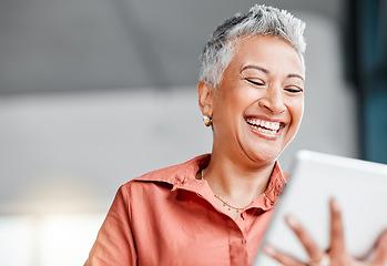 Image showing Tablet, senior and business woman laughing in office at comic meme or joke on social media. Technology, funny comedy and happy elderly female with touchscreen for web scrolling or internet browsing.