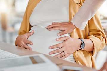 Image showing Pregnant woman, hand touch and stomach closeup of women in a office ready for work. Pregnancy, new mother and co working showing mama support by touching abdomen in the workplace with care and love