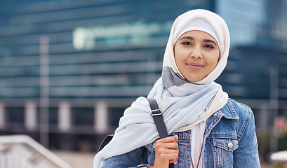 Image showing Muslim, portrait and woman in city for travel, goal and future career against building background. Islamic, face and girl student in New york for intern, program or experience with vision or mindset