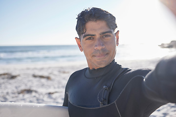 Image showing Surfer selfie, beach and man portrait at beach ready for surfing, water sports and exercise. Mockup, sea and summer vacation of a athlete outdoor in the sun with surfboard for fitness in the morning