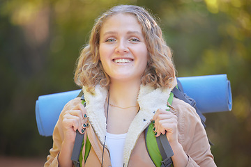 Image showing Hiking, happiness and portrait of woman with backpack, smile and freedom on trekking adventure in nature. Health, fitness and camping, happy face of gen z person on hike in mountains or forest of USA