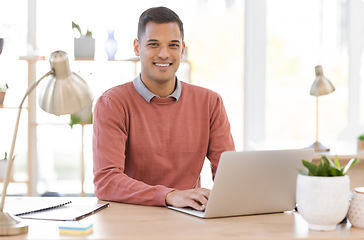 Image showing Laptop, office and portrait of man at a startup tech company working with leadership, business management and smile. Computer network, information technology and worker, person or manager at his desk