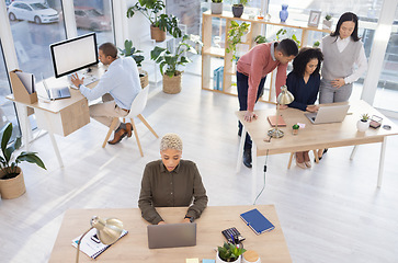 Image showing Office team above, busy people and computer for startup management, workflow communication and company planning. Diversity employees, staff or worker group working on technology for online business