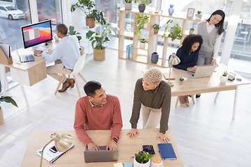 Image showing Leadership, black woman or manager coaching a worker in startup or group project in a digital agency. Team work, laptop or employee helping, talking or speaking of our vision or branding direction