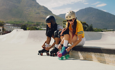 Image showing Friends at skate park, urban and rollerblading with sports outdoor, fun and ready for skating in city with helmet for safety. Young, black man and woman with exercise, extreme sport and lifestyle