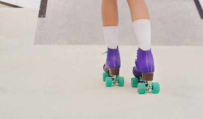 Image showing Park, hobby and legs of a woman rollerskating for fitness, training and sport on the ground. Exercise, practice and feet of a girl doing cardio to skate for urban sports, learning and activity