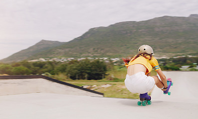 Image showing Fitness, roller skates and woman training for competition, exercise and hobby for wellness, healthy lifestyle and tricks. Female athlete, lady and skater in park, practice and workout for techniques