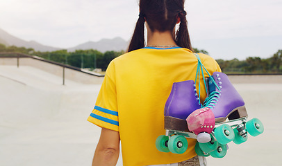 Image showing Rollerskate, mockup and back with a woman at a skatepark for fun, recreation or training outdoor. Fitness, skating and hobby with a female skater walking outside on a ramp for sports practice