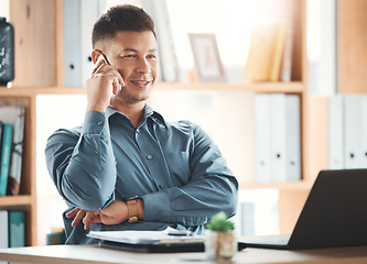 Image showing Office, laptop and man on phone call at desk with smile, crm and b2b communication at advisory startup. Business manager, conversation and networking, happy businessman speaking on smartphone at work