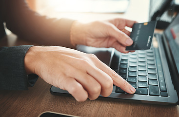 Image showing Online shopping, credit card and hands typing on a laptop for ecommerce, payment and banking. Business, finance and employee on the internet for retail, purchase and ordering from the web on a pc