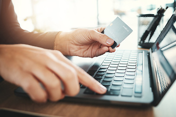 Image showing Banking, credit card and hands on a laptop for ecommerce, payment and online shopping. Business, finance and employee on the internet for retail, purchase and ordering from the web typing on a pc