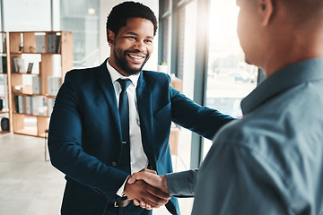 Image showing Businessman, handshake and smile for partnership, b2b or trust in promotion, deal or agreement at office. African American male manager shaking hands with employee for welcome, thank you or greeting