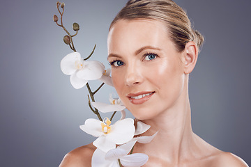 Image showing Beauty, flowers and skincare with portrait of woman for natural product, wellness and spa treatment. Cosmetics, relax and health with face of model and orchid plant for facial, self care and growth