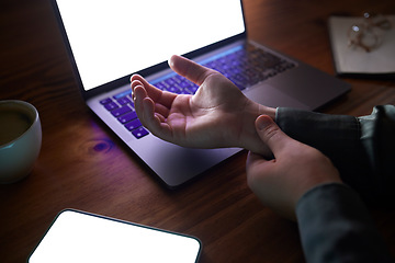 Image showing Office, night and woman with wrist pain, injury or accident while working on a project with a laptop. Medical emergency, professional and female employee with a muscle sprain in her hand in workplace