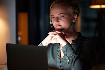 Image showing Night, laptop and thinking with woman in office for overtime, planning and strategy idea. Digital, technology and internet with employee and deadline at desk for goals, management solution and email