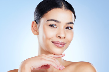 Image showing Portrait, aesthetic and skincare with a model black woman in studio on a blue background for natural treatment. Face, beauty and spa with an attractive young female posing to promote cosmetics