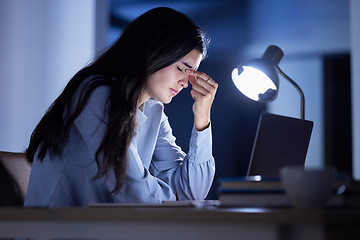 Image showing Business woman at desk, headache and burnout, stress and corporate fatigue, laptop and glitch. Working night, overtime and deadline problem, 404 and tired with overworked employee and frustration