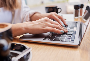 Image showing Laptop, coffee shop and woman hands on keyboard typing for research, remote work and freelance career. Computer, business networking and worker in cafe working on internet, website and writing email