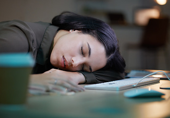 Image showing Night, sleeping and tired woman on her desk computer with depression, burnout and mental health risk. Business person, workaholic or young employee fatigue, low energy and time management problem