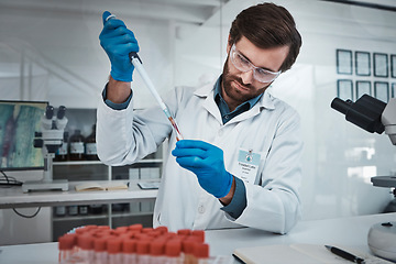 Image showing Science, DNA blood and man scientist for vaccine research test, analysis or investigation in laboratory. Healthcare worker, medical professional or biotechnology expert with sample test tube for data