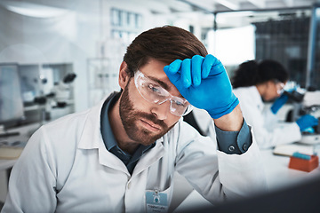 Image showing Tired man, doctor and scientist with headache at night suffering from burnout, stress or overworked in the lab. Exhausted male in science research, stress or thinking while working late in laboratory