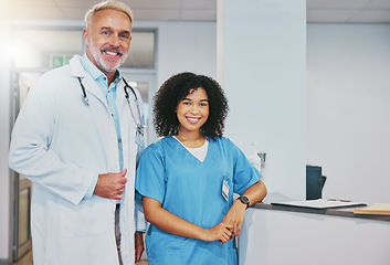 Image showing Health team, doctor and nurse with portrait, medical professional and collaboration with diversity and smile in clinic. Healthcare, senior man and black woman with medicine, partnership and happy