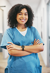 Image showing Nurse, portrait and black woman with arms crossed in hospital for healthcare. Medical, wellness and happy, confident and proud female physician, professional or doctor from South Africa in clinic.