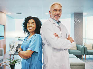 Image showing Healthcare team, doctor and nurse with portrait, medical professional and collaboration with diversity and smile in clinic. Health, senior man and black woman with medicine, partnership and happy