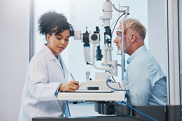 Image showing Vision, eye exam and writing with a doctor woman or optometrist testing the eyes of a man patient in a clinic. Hospital, medical or consulting with a female eyesight specialist and senior male