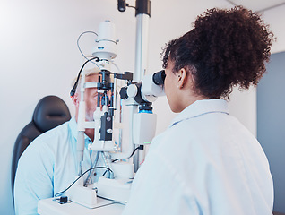 Image showing Optometry, eye exam and ophthalmologist testing patient vision or eyes using a slit lamp machine by a doctor. Healthcare, eyecare and medical insurance professional doing a visual examination on man