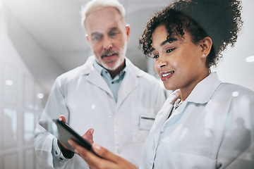 Image showing Doctors, tablet and clinic, health team and communication, digital medical document or test results. Partnership, window and senior man with black woman, conversation and technology in healthcare