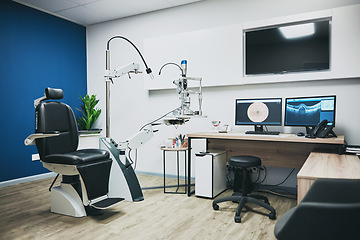 Image showing Optometry, empty room and equipment for vision test for eye care in a optical clinic or store. Optic healthcare, ophthalmology and computers, technology or machines in optometrist consultation office