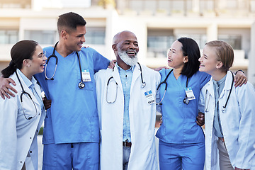 Image showing Doctor, hug and smile for healthcare collaboration, partnership, unity or trust in the city. Happy group of medical team smiling and hugging in teamwork support, nursing or medicine in solidarity