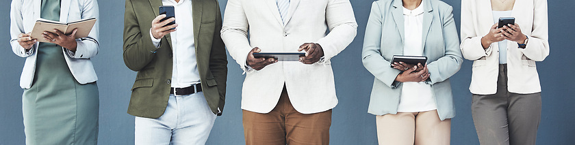 Image showing Technology, recruitment and business people waiting for an interview in line in the office. Hiring, queue and professional employees with digital tablets and phones standing for meeting in workplace.