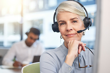 Image showing Face of call center agent, woman telemarketing consultant or virtual assistant in customer services and support focus. Contact us, ecommerce help and senior person portrait in business crm solution