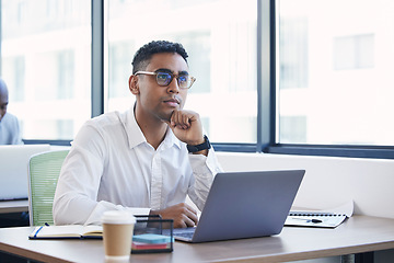 Image showing Thinking, idea and business man with laptop in office for review, writing email and planning schedule. Technology, brainstorming and male entrepreneur on computer for research, report and website