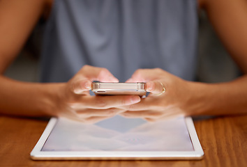 Image showing Communication, social media and hands of a woman with phone, tablet and internet for connection. Digital, website and employee in business typing on a mobile app with mockup space on tech for a brand