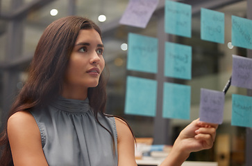 Image showing Business, woman and thinking for brainstorming, planning or lady with ideas for opportunity. Corporate, female employee or manager with sticky notes, advertising campaign or sales growth in workplace