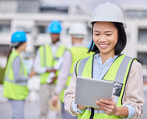 Image showing Leadership, tablet or happy Asian woman contractor with smile for management or engineering success in construction site. Logistics, leader or warehouse manager in safety helmet or vision development