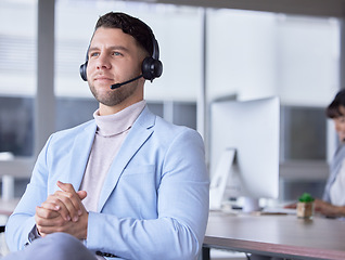 Image showing Callcenter, focus or business man with microphone for customer support, consulting or networking in office. Thinking, CRM or focus sales advisor on tech for telemarketing, focus or telecom contact us