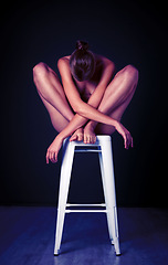 Image showing Art, beauty and body of woman in studio for erotic, mystery and desire on black background space. Girl, chair and creative sitting, posing and gesture for expression, deco and mysterious aesthetic