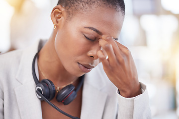 Image showing Customer service consultant, headache and woman burnout from telemarketing on contact us CRM or African telecom. Tired call center face, ecommerce and information technology consulting on microphone