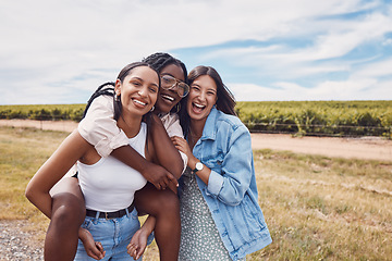 Image showing Friends, portrait and piggyback of women on holiday, vacation or trip outdoors. Group freedom, comic adventure and happy girls laughing at joke, having fun or enjoying quality time together in nature