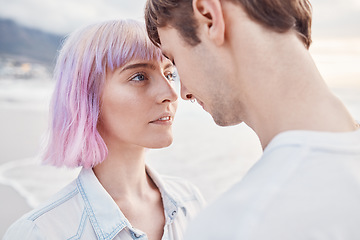 Image showing Intimacy, beach and couple with a love moment while on summer date for valentines day or anniversary. Romance, sea and young gen z man and woman with intimate embracing by ocean together in Australia