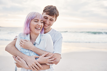 Image showing Love, beach and couple hug on date for valentines day, ocean fun and romantic embrace at sunset. Romance, happiness and gen z woman and man hug on tropical valentine holiday in Indonesia in evening.