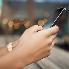 Image showing Hands, phone and communication chatting in the city for social media or texting on table. Hand of person on mobile smartphone talking or online browsing, internet with 5G connection in town on mockup