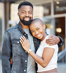 Image showing Black couple, portrait and hug in city for love, care and happiness on date together in Nigeria. Happy man, woman and partner in urban street, road and outdoor for trust, support and relax with smile