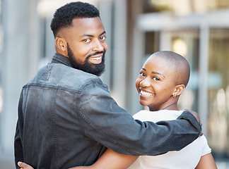 Image showing Back, black couple and portrait in city for love, care and happiness on date together in Nigeria. Happy man, woman and walking in urban street, road and outdoor with hug, freedom and relax with smile