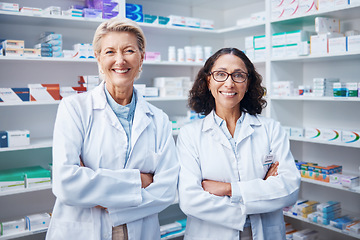 Image showing Teamwork, portrait and pharmacists with arms crossed in pharmacy, drugstore and medicine shop. Healthcare, pharma wellness and happy, proud and confident smile of medical doctors or senior women.