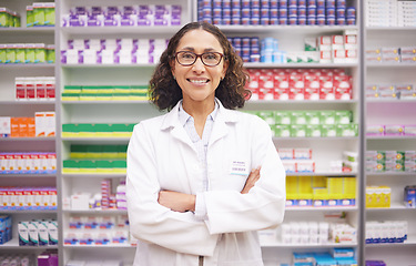 Image showing Pharmacy, medical stock and portrait of a woman pharmacist ready for work. Pharmaceutical store, retail inventory and healthcare drug medication with a happy employee feeling proud of dispensary